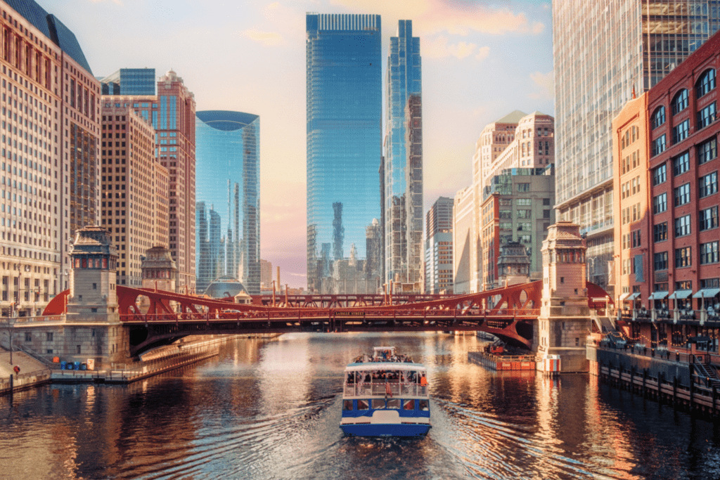 Photo of Downtown Boston Boat cruising down the river during daylight